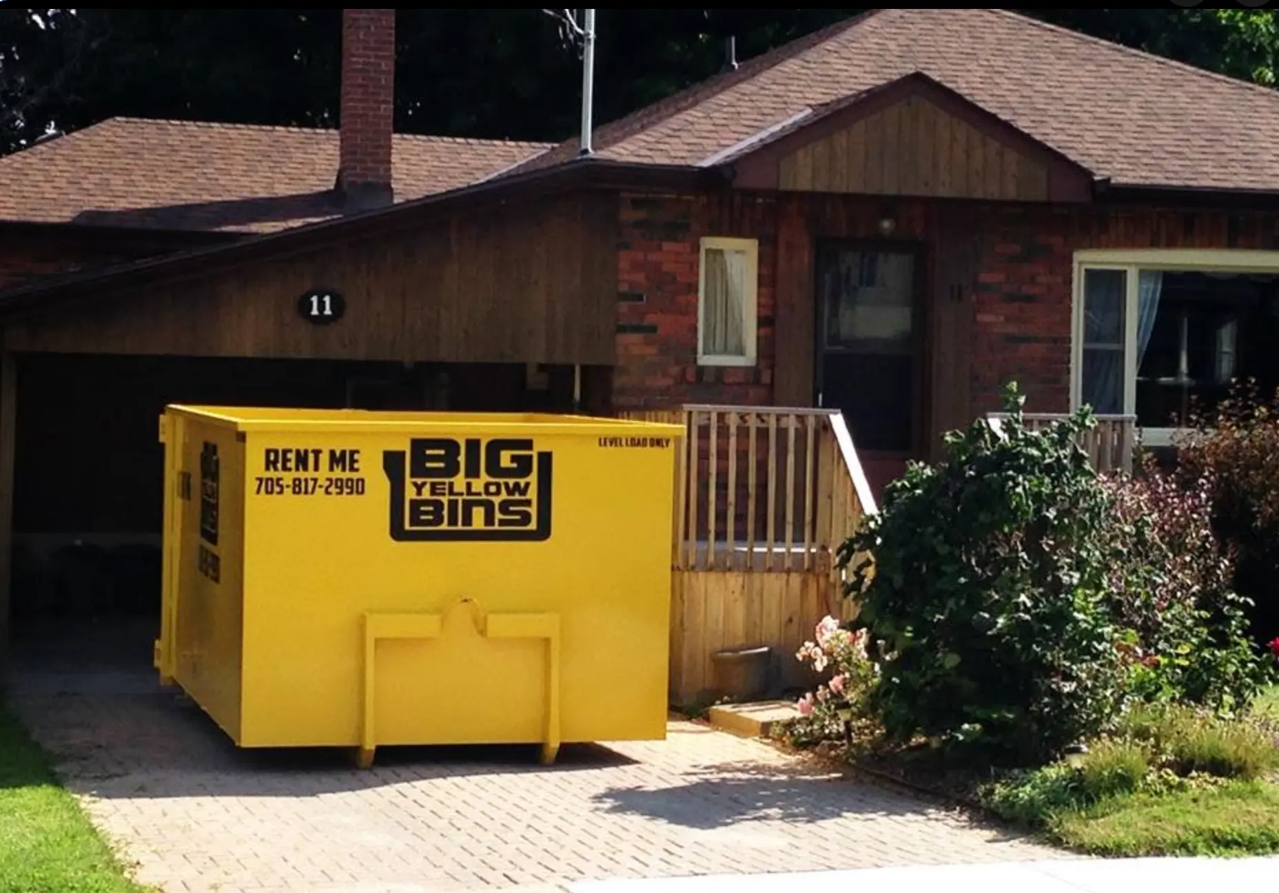 14 Cubic Yard Bin from Big Yellow Bins on a driveway in Simcoe County