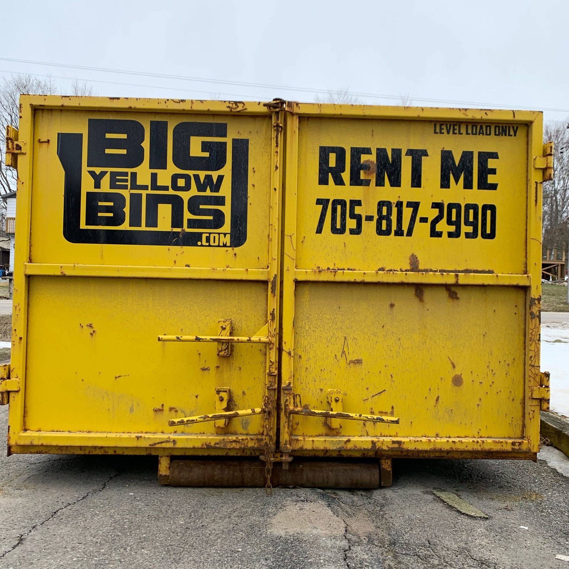 Big Yellow Bins dumpster ready for a residential cleanup in Barrie, Ontario